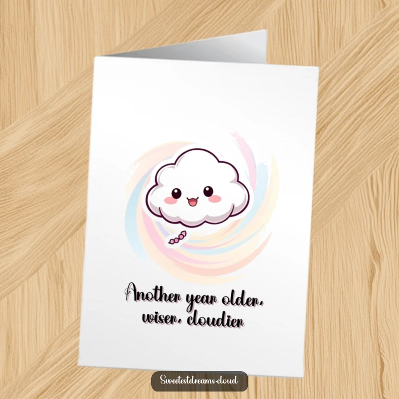 Funny Free Printable Birthday Card featuring a playful cloud character floating joyfully in pastel color swirls. Perfect for a downloadable gift.
